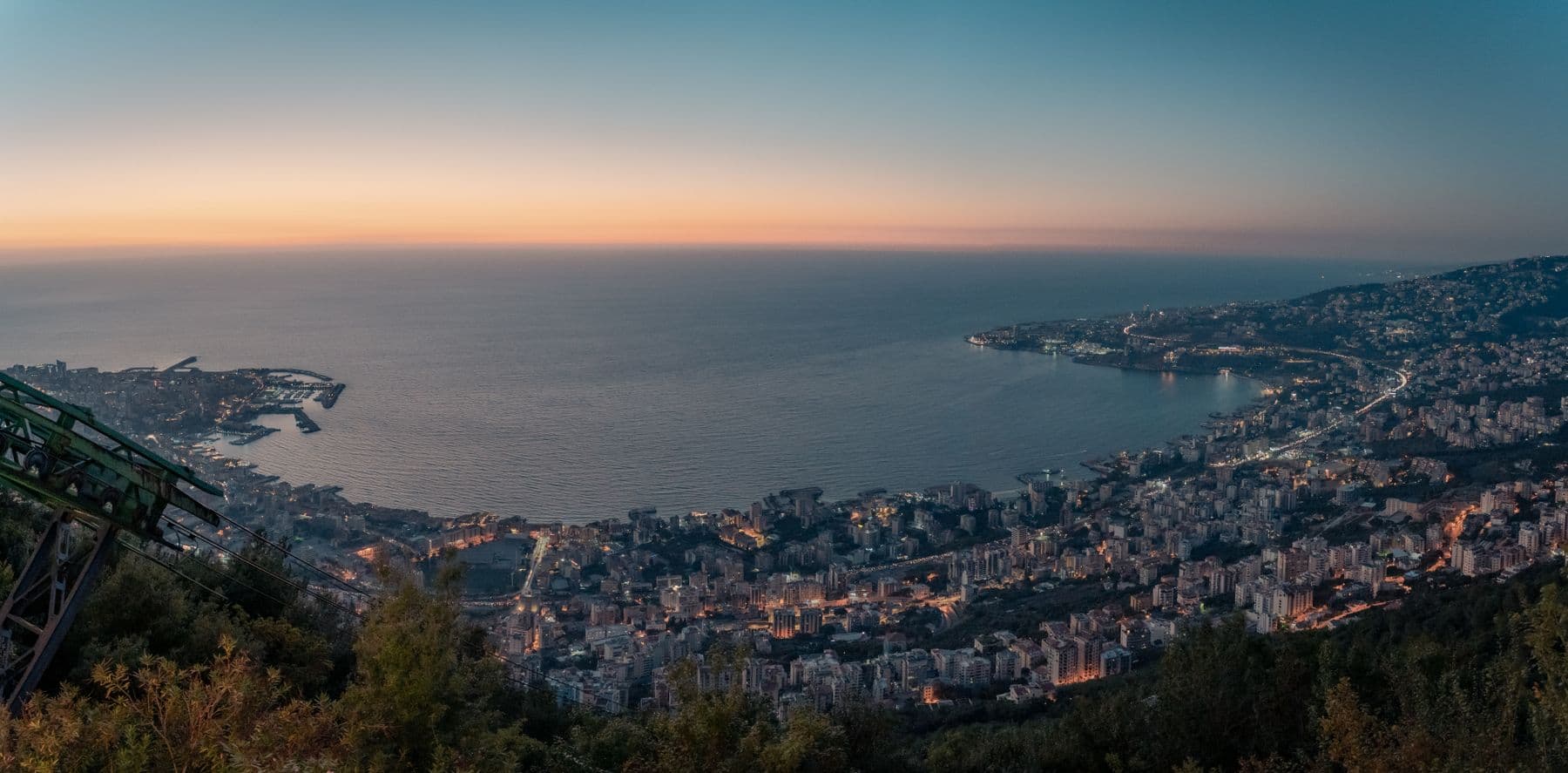 View over Jounieh Bay and the coastal road from the hills of Harissa at sunset